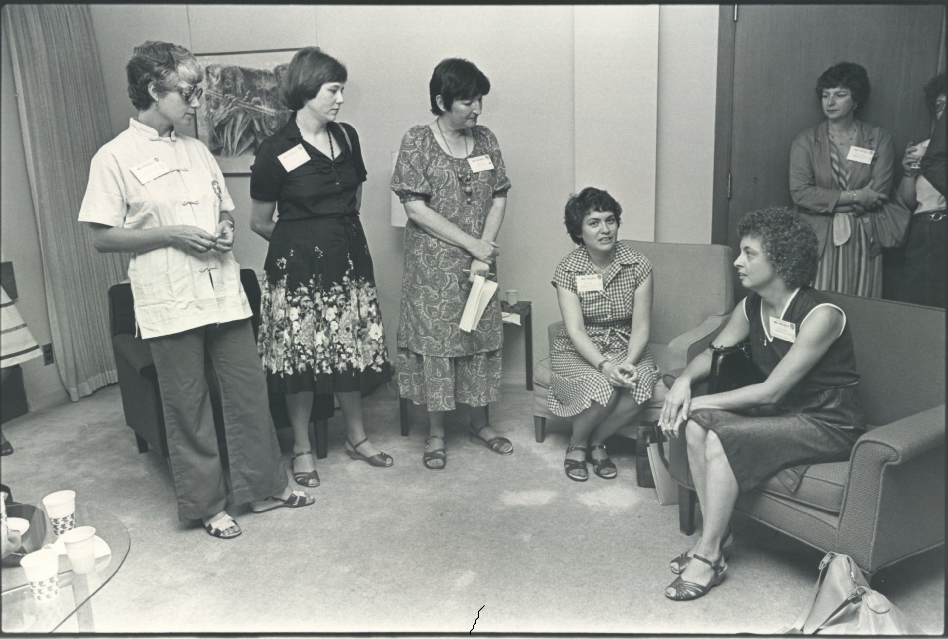 The four members of the Morgantown National Endowment for the Humanities Women in the Community Project team are pictured here with Barbara Haber, Curator of Printed Books at the Schlesinger Library for the History of Women in America at Radcliffe College in Cambridge, Mass. Team members were: Dr. Judith Gold Stitzel, Carroll Wetzel Wilkinson, Barbara Caron, and Meredith Pearce, 1981. Carroll Wilkinson Papers,WVRHC.